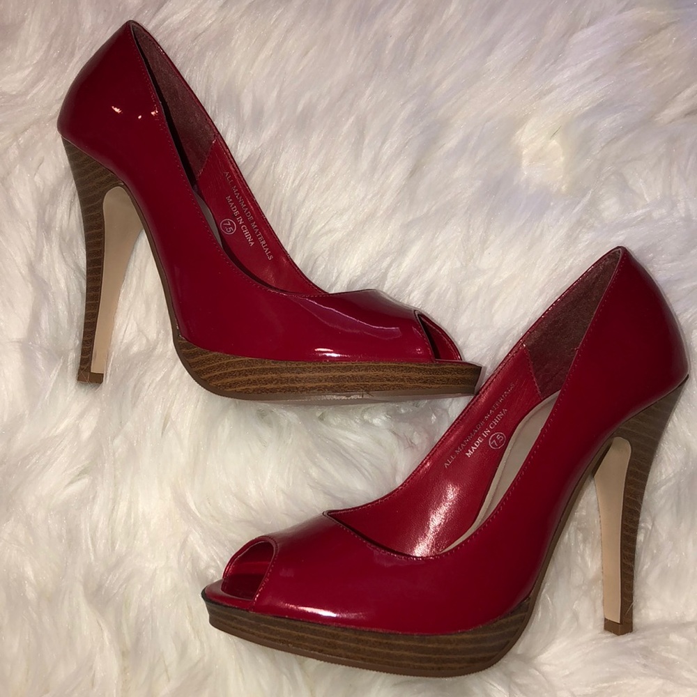 Never worn red patent leather heels